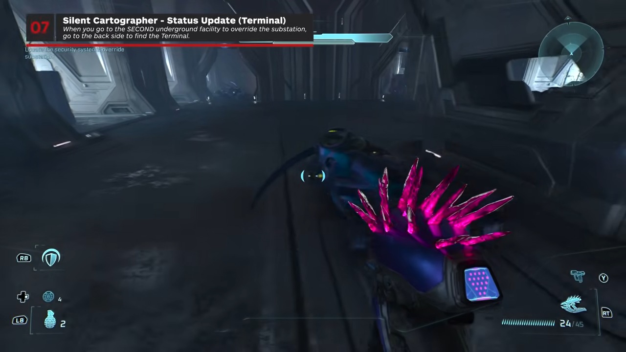 Inside the system-override room, pass the objective device, go to the far wall, and turn around to reveal the terminal.