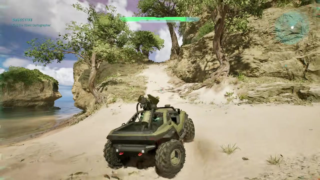 The Warthog parked inside facing the exit and blue arrows on the floor.