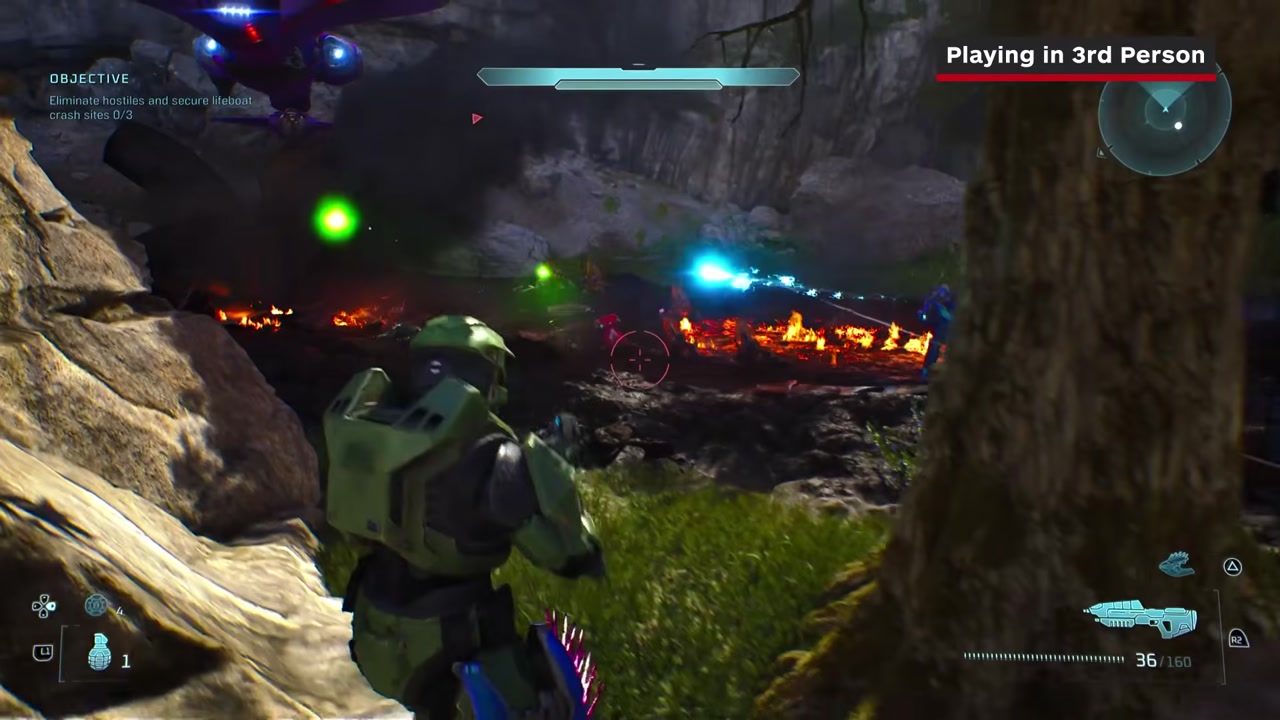 Third-person aim-down-sights view over Master Chief’s shoulder.