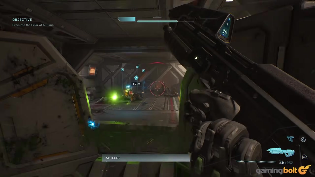 A doorway or elevator with nearby weapons and ammunition.