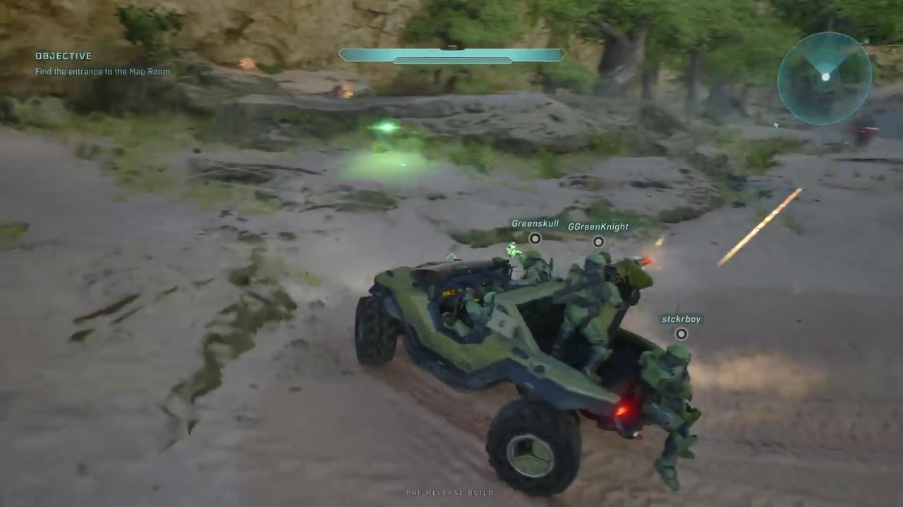 Four players in Warthog with water physics visible