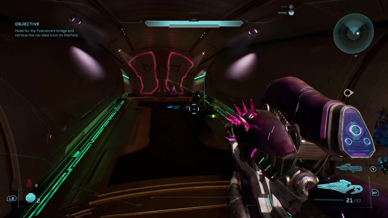 The area with the glowing blue light sources on the ground